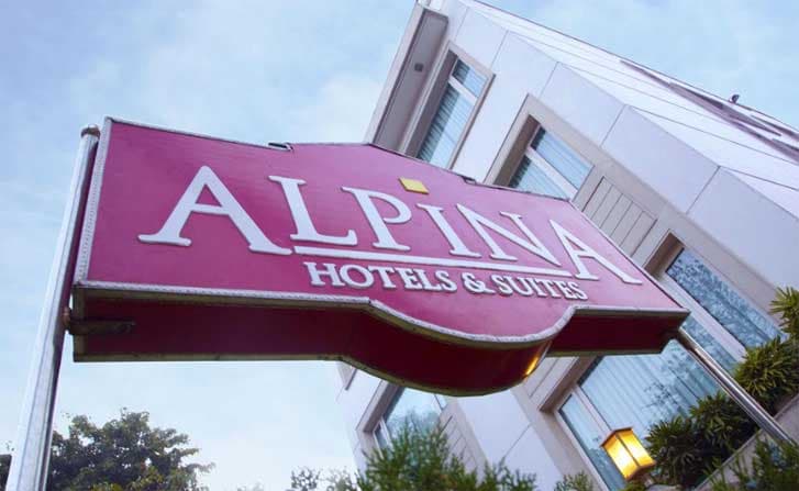 Alpina Hotels & Suites - Image 1